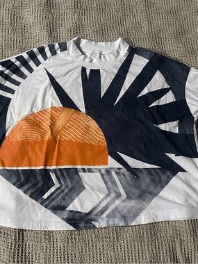 Unk White Tee with Navy Graphic and Orange Sunburst